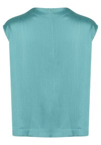 Haut à manches courtes en teal en tissu brillant avec des rayures verticales. Doté d'un col rond et d'une fermeture éclair dans le dos.