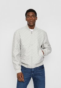 Tommy Hilfiger REVERSIBLE VARSITY JACKET - Bomber Jacket - calico