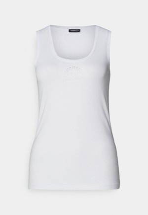 Camiseta sin mangas blanca hecha de una tela suave, con un escote redondeado y una forma ajustada. Decorada con un sutil detalle de logo con strass.