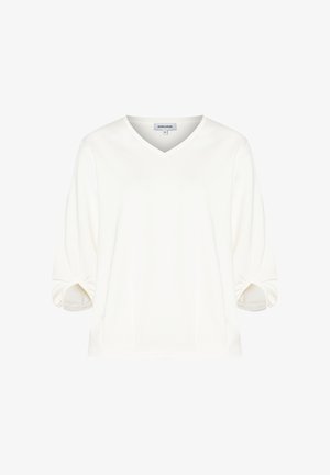 Weiße V-Ausschnitt-Bluse mit drei Viertelärmeln, die an den Bündchen Raffungen aufweist. Weicher, glatter Stoff mit lockerer Passform.