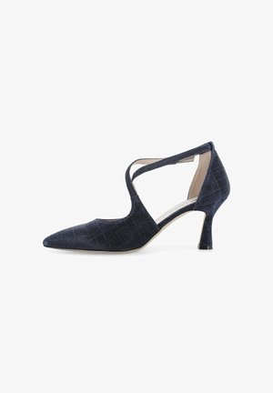 Scarpa alta con tacco in tessuto blu navy con punta appuntita, cinturini incrociati e tacco curvo di media altezza, vista di profilo laterale.