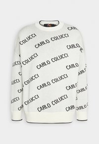 Knit sweater in cream with black "CARLO COLUCCI" text pattern, crew neck, and ribbed cuffs, featuring a contrasting hem detail.