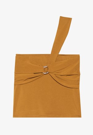 Μουσταρδί τοπ με έναν ιμάντα στον ώμο, στριφτό μπροστινό σχέδιο και μεταλλική αγκράφα. Κατασκευασμένο από μαλακό, ελαστικό ύφασμα.