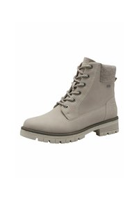 Bottine waterproof beige avec un dessus en daim, un col grisé texturé, des lacets gris et une semelle en caoutchouc robuste. Présente des accents de couture.