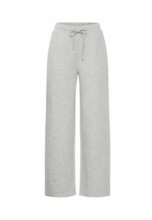 Pantaloni della tuta larghi grigi chiari realizzati in un morbido tessuto testurizzato. Presentano una vita elastica con coulisse per la regolazione.