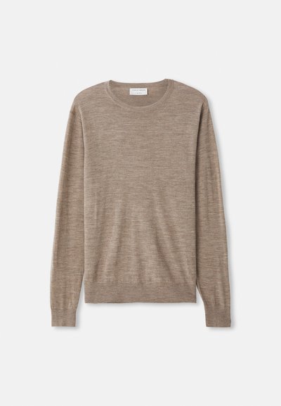 Beige sweater made of fine-knit material. Features a round neckline, long sleeves, and ribbed cuffs and hem. Simple and classic design.