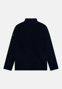 Pull en polaire navy avec un col montant, des manches longues et un design raglan. Présente un discret logo sur la manche gauche. Texture douce.