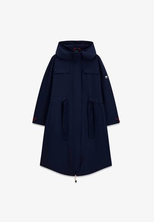 Navy blue long parka with hood, front zipper, flap pockets on chest and hips, adjustable waist ties, and logo patch on left sleeve.
