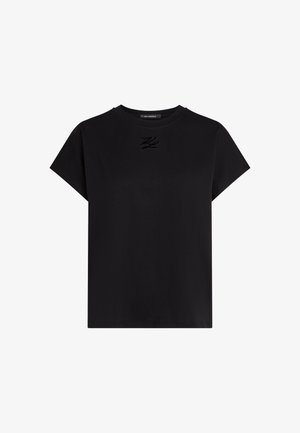 Sort t-shirt med korte ærmer og rund halsudskæring med diskret skinnende logodetalje centreret nær halsudskæringen.