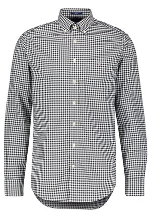 Langärmliges schwarz-weiß kariertes Hemd mit durchgehender Knopfleiste, Knopfverschluss am Kragen und Brusttasche vor weißem Hintergrund.