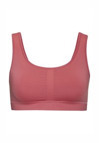Sostén inalámbrico en una suave tela rosa pálido, con tirantes anchos, una textura suave y un diseño sin costuras para mayor comodidad y una forma natural.