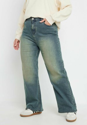 Licht gewassen, wijde jeans met een licht vervaagd uiterlijk, voorzien van een knoopsluiting, voorzakken en een comfortabele pasvorm.