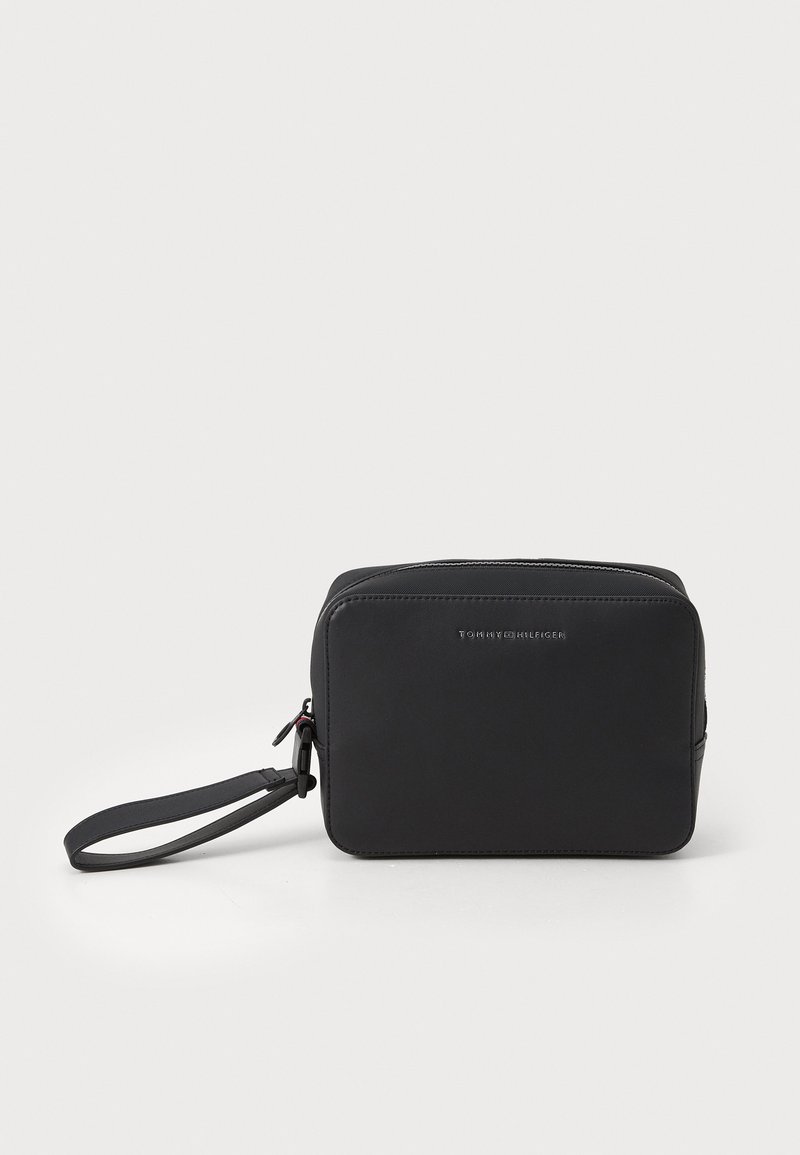Black zippered pouch with a rectangular shape, made from smooth material, featuring a wrist strap and embossed brand logo on the front.