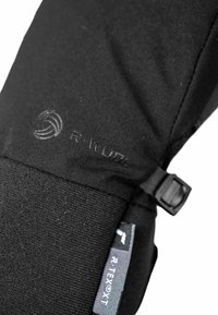 Zwarte, gestructureerde stoffen handschoen met R-TEX XT-branding en een verstelbare zwarte band. Een glad oppervlak contrastert met ribbelaccenten.