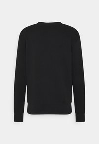 Svart långärmad crewneck sweatshirt med ribbade cuffs och nederkant, visad bakifrån mot en enkel vit bakgrund.