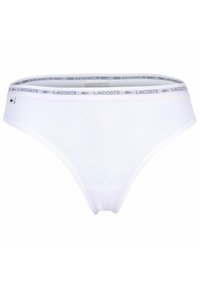 Białe bawełniane bikini z kontrastowym paskiem z logo, na którym znajduje się napis "LACOSTE" w odcieniu szarości oraz mała metka z logo z boku.