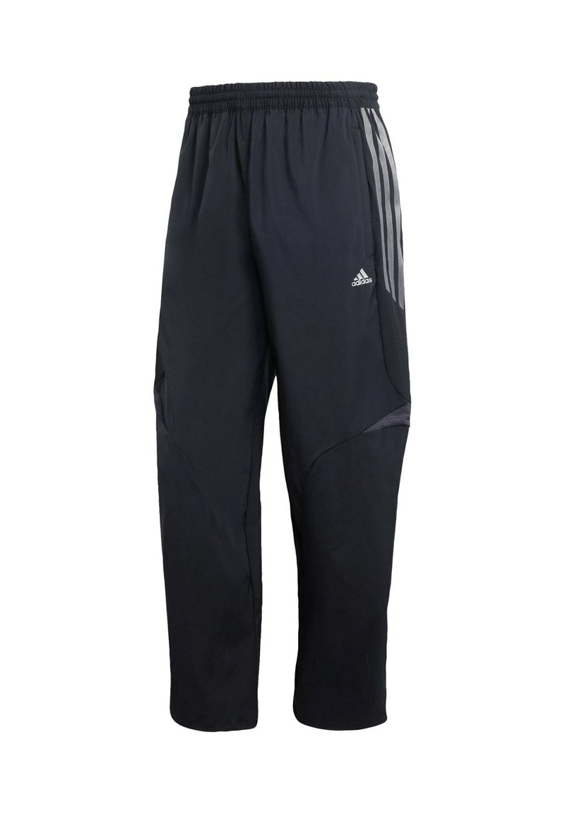 Svarta träningbyxor med elastisk midja, som har grå sidostreck, en texturerad panel och en avsmalnande bendesign.