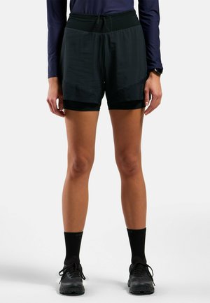 Black running shorts with an elastic waistband, layered design, and inner lining. Fabric appears lightweight with a smooth texture.