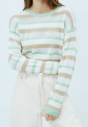 Striped knit sweater in white, mint green, and beige. Features a ribbed neck and cuffs, with a loose fit and open weave texture.