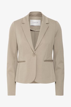 Beežist lõikega naiste bleiser ühe nupuga sulgemisega, sisselõigatud krae ja kahe esiosas asetseva trimmitud taskuga.