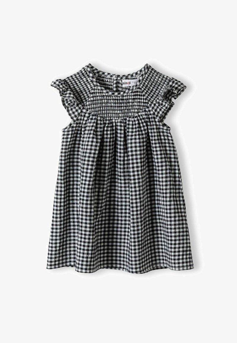 Schwarz-weißer Karokleid mit gerüschten Trägern und gesmoktem Oberteil. A-Linien-Silhouette, leichtes Material und knielanges Design.