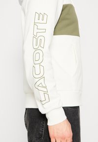 Lacoste ZIPPED COLOURBLOCK HOODIE UNISEX - Mikina so zipsom - flour/oliv