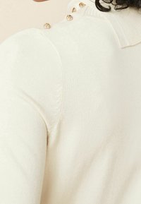 Next Sweter