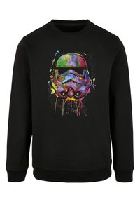 Melna sporta krekls ar krāsainu, plankumainu grafiku, kurā attēlots stormtrooper ķiveres attēls uz priekšpuses. Izgatavots no mīkstas auduma ar ribinātām piedurknēm.
