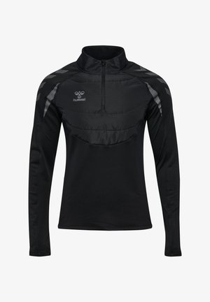 Schwarzes langärmliges Sportoberteil mit Viertelreißverschluss, gepolstertem Brustbereich und reflektierenden Chevron-Streifen auf den Schultern, mit hummel-Logo auf der Brust.