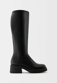 Knee-high black boots made of smooth, textured synthetic material. Square toe and chunky block heel with minimal seams and sleek design.