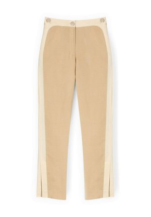Pantalon beige fuselé avec des panneaux latéraux plus clairs, boutons avant à la taille et fentes latérales à l'ourlet, posé à plat sur un fond blanc.