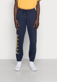 adidas Originals - SCRIPT PANT - Donji dijelovi trenirke - collegiate navy Minijatura 1