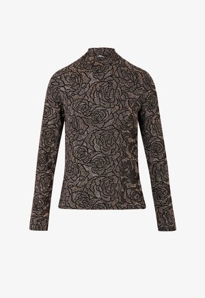 T-shirt à manches longues avec un col montant, fabriqué en tissu texturé avec un motif noir et rose métallique sur un fond sombre.