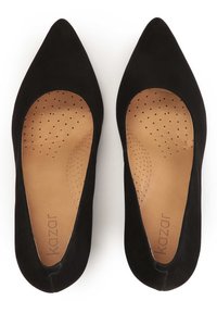 Black suede pointed-toe flats with a low-cut vamp, featuring perforated insoles and a smooth, light brown interior with brand logo.