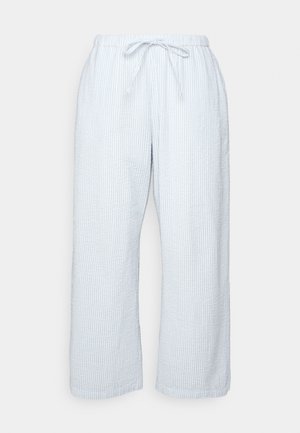 Lys blå, stripete, vide bukser med elastisk midjebånd og justerbar snøring. Laget av et mykt, teksturert stoff.