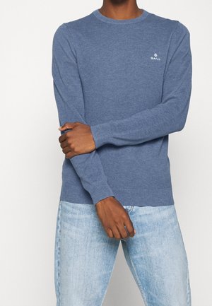 Neule - mottled light blue