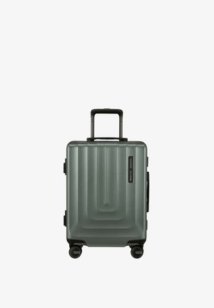 Hard-shell suitcase in matte dark green with a ribbed design. Features a telescopic handle and four multi-directional wheels.