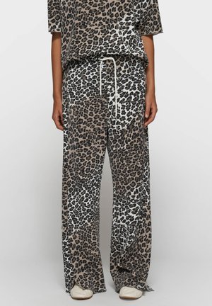 - Spodnie materiałowe