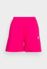 Pink athletic shorts with an elastic waistband, made from soft material. Features a small white logo on the left leg. Classic fit.