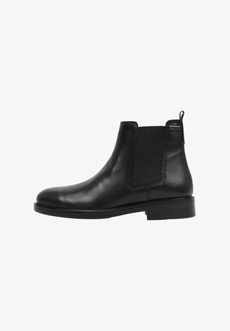 Black leather Chelsea boots with elastic side panels, rounded toe, and pull tab. Smooth texture and flat rubber sole for stability.