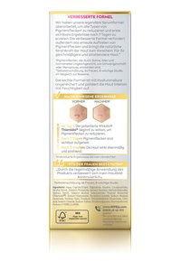 Beige package for skincare serum with gold accents, featuring printed text, icons, and a translucent section showing product texture.