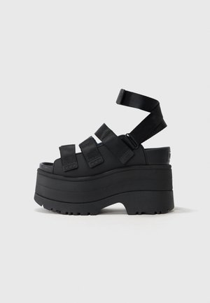 GOLDENRISE - Platform sandals - black