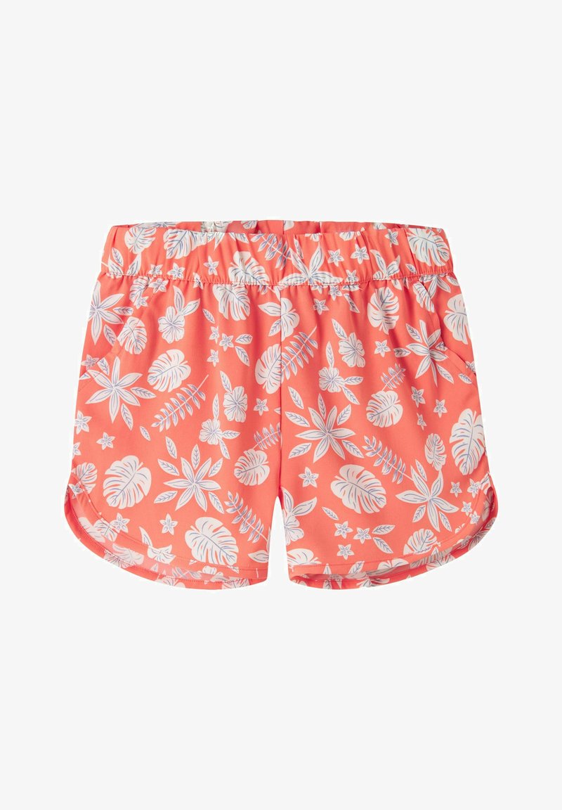 Shorts pour femmes couleur corail rose avec imprimé floral tropical blanc et ceinture élastique, présentant un ourlet courbé et un style estival décontracté.
