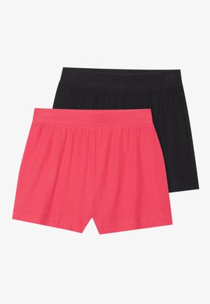 Dos pares de pantalones cortos, uno en un rosa vibrante y otro en negro, hechos de una tela acanalada con una cintura elástica y una textura sutil.