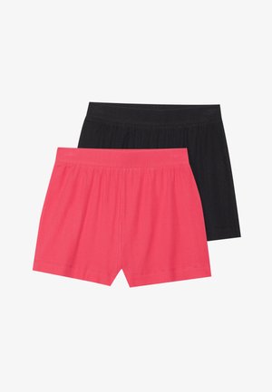 Två par shorts, ett i livlig rosa och ett i svart, tillverkade av ett ribbat tyg med resår i midjan och subtil textur.