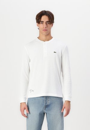 Lacoste Tops ar garām piedurknēm - flour