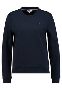 Felpa blu navy realizzata in tessuto misto cotone, caratterizzata da un collo tondo, maniche lunghe e un piccolo logo ricamato sul petto.