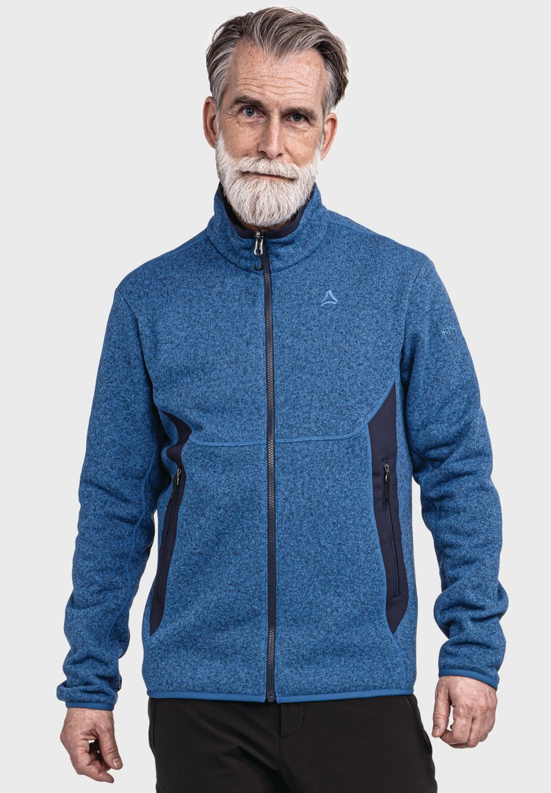 Blaue Fleecejacke mit hohem Kragen, Reißverschluss vorne und navyblauen Akzenten. Verfügt über zwei Reißverschlusstaschen und eine strukturierte Oberfläche.