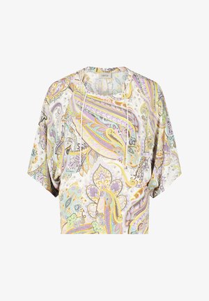 Bluzka w wzory z lekkiego materiału. Posiada okrągły dekolt, krótkie rękawy i luźny krój z kolorowymi wzorami paisley.