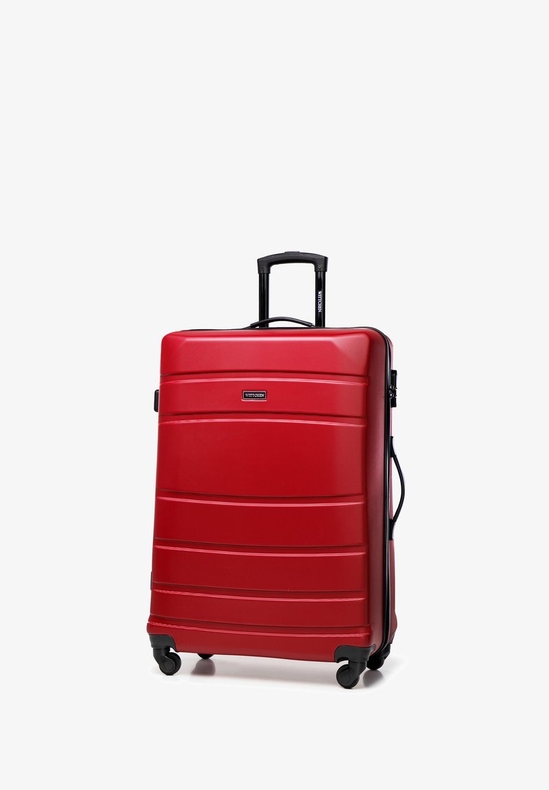 Roter Hartschalenkoffer mit glatter Oberfläche, horizontalen Rillen, schwarzem Teleskopgriff und vier schwenkbaren Rädern für einfaches Manövrieren.
